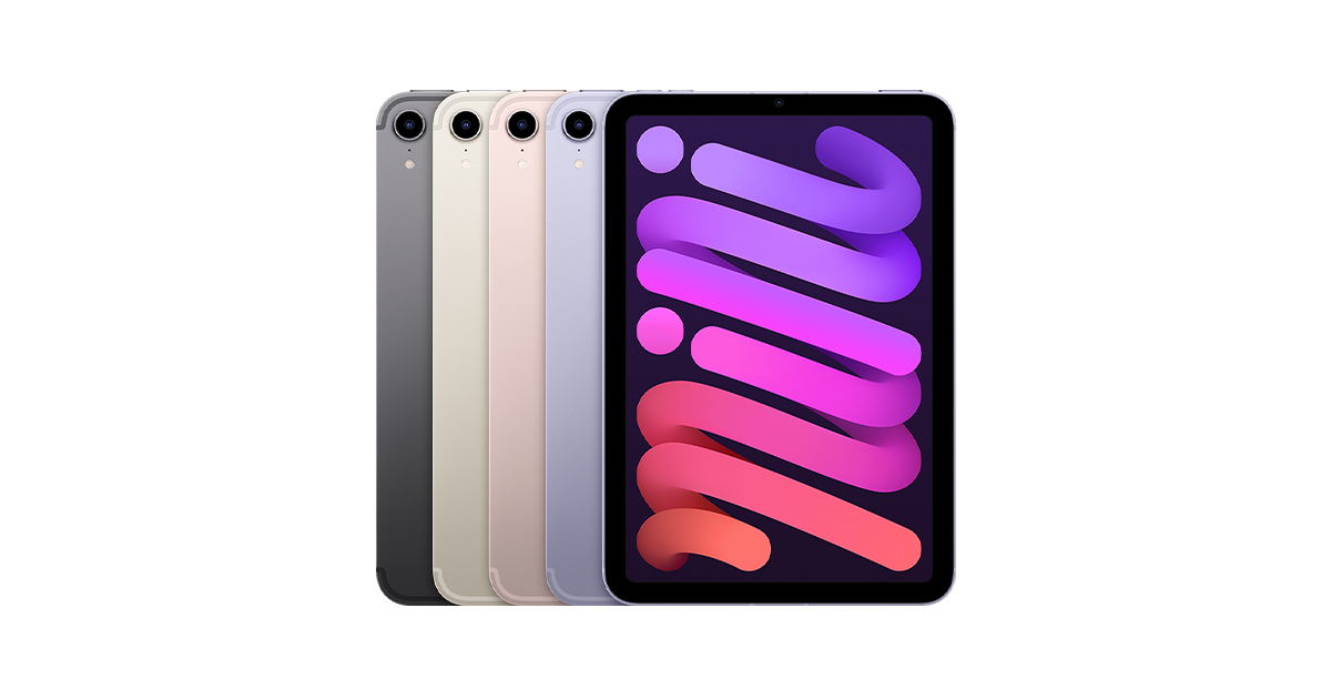 The iPad mini in a models hand with the default "mini" wallpaper on the iPad.